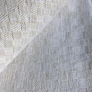 A vintage French off white linen towel