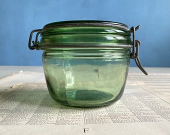 A vintage French heavy green glass Solidex canning jar