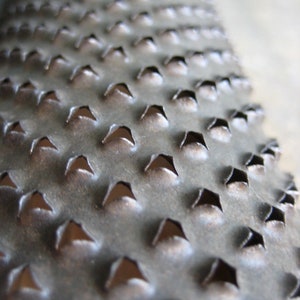 A vintage French grater