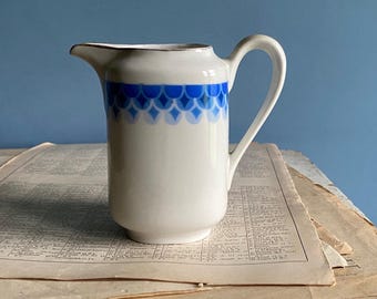 A vintage French porcelain milk jug, creamer, blue and white, 1930s