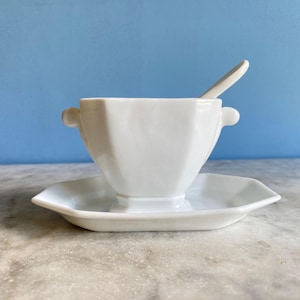 A vintage French white porcelain mustard dish and spoon