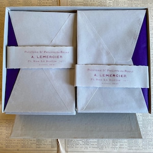 A vintage French box of writing paper and lined envelopes