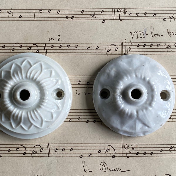 A vintage French porcelain ceiling rose