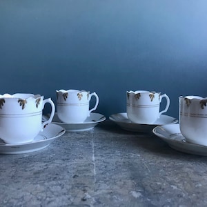 Vintage French porcelain coffee cups and saucers