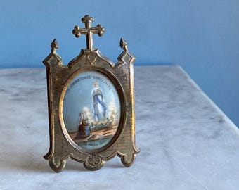 A small vintage shrine to the Immaculate Conception, metal and porcelain