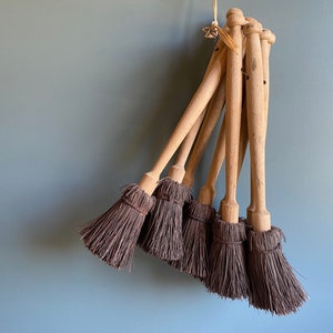 Two vintage French wooden handled brushes