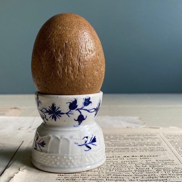 A vintage French wooden darning egg