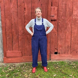 A pair of vintage French dark blue work dungarees, overalls, bleu de travail