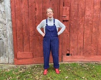 A pair of vintage French dark blue work dungarees, overalls, bleu de travail