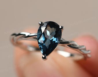 Tropfenförmige London Blue Topas Twist Verlobungsring Massiv Silber November Birthstone Seilring