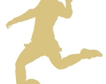May include: A gold silhouette of a person kicking a soccer ball. The figure is in mid-kick, with one leg extended and the other planted on the ground. The background is plain white.