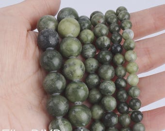 May include: Multiple strands of round, polished green stone beads in varying sizes, ranging from dark forest green to lighter olive tones with natural mottled patterns and visible inclusions, featuring the text EllenDIYBeads at the bottom.