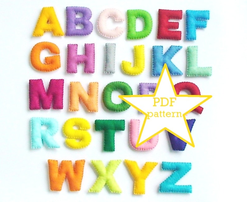 May include: A set of felt alphabet letters in various colors, including red, green, yellow, blue, orange, pink, and purple. The letters are arranged in alphabetical order and are stitched with a white thread. A yellow star with the text "PDF pattern" is in the center of the image.