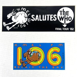 May include: Two vintage KMEL FM radio station stickers. One black sticker features a camel mascot and text "KMEL Salutes The Who Final Tour '82". The other blue sticker has a camel mascot, the number "106", and text "Rockin' The Bay".