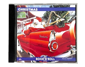 May include: CD case with a Christmas theme. The cover art features Santa Claus driving a red convertible with a saxophone and guitar in the back. The text "CHRISTMAS" and "THE ROCK'N'ROLL ERA" are visible.