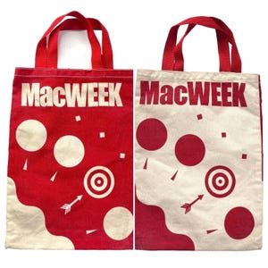 May include: Two red and white tote bags with the text "MacWEEK" printed on the front. The bags have a white background with red circles, squares, and an arrow. The bags have red handles.