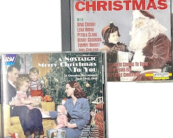 May include: Two compact discs with Christmas music. The left disc is titled "A Nostalgic Christmas To You" with a picture of a family in a living room. The right disc is titled "A 1940's Christmas" with a picture of Santa Claus and a young girl.