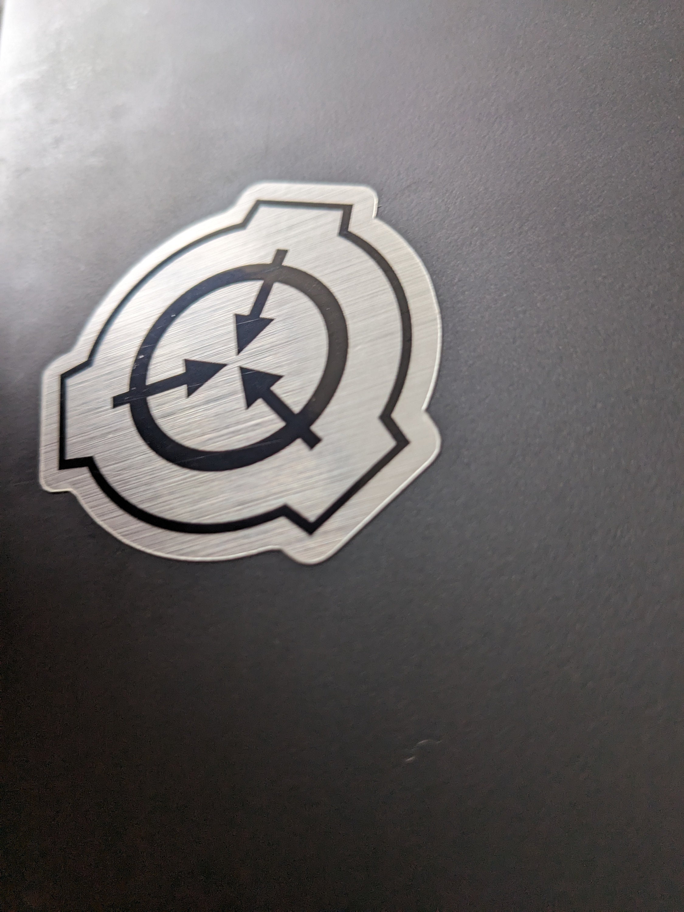 SCP Logo 2 Inch Black on Brushed Metal Bg Die-cut Sticker Hi 