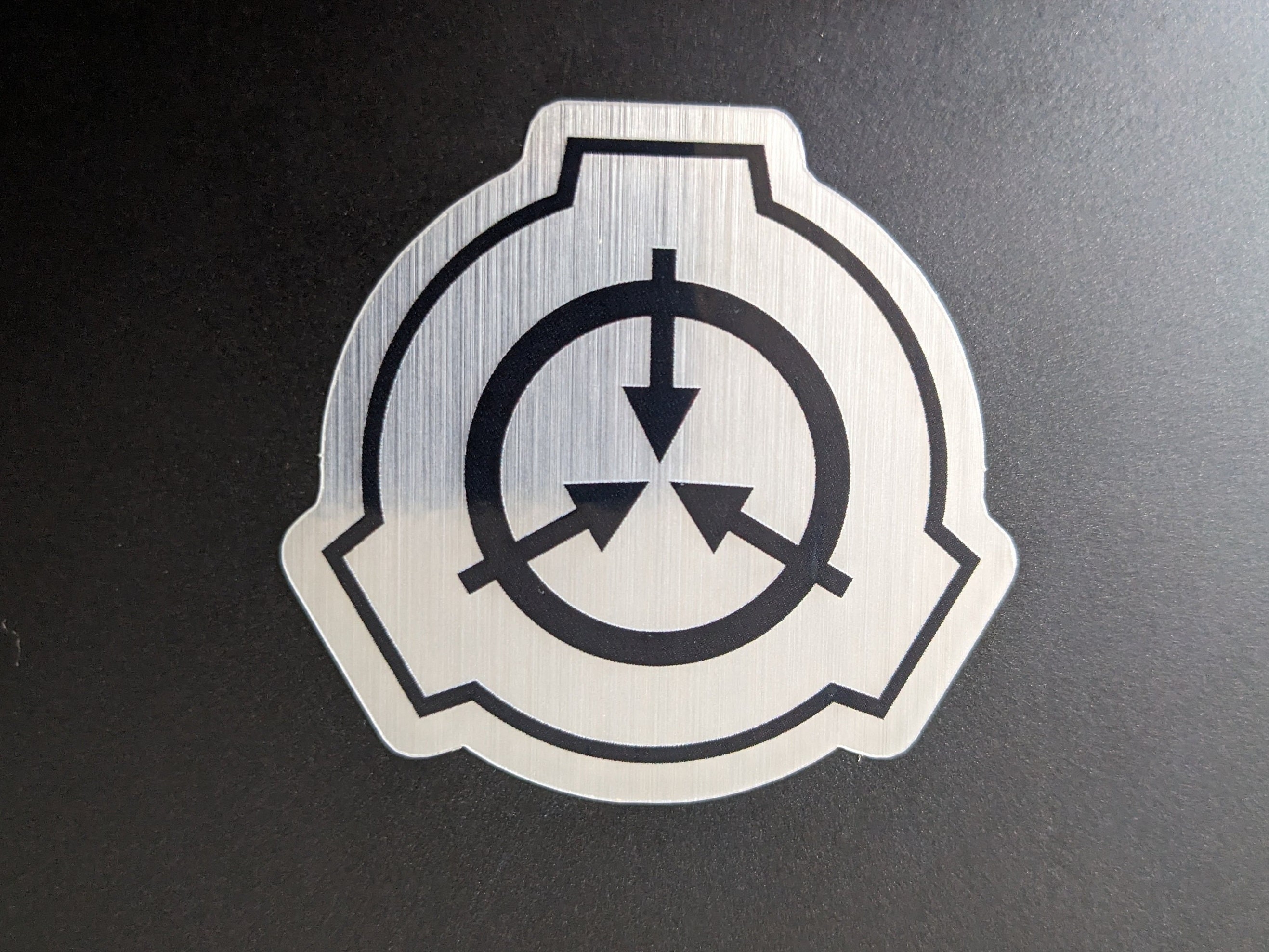 SCP Logo 2 Inch Black on Brushed Metal Bg Die-cut Sticker Hi 