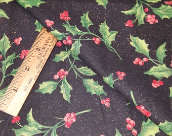 May include: Black fabric with a repeating pattern of green holly leaves and red berries. The fabric has a subtle gold glitter finish.
