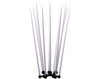 Candelabro SPIDER de Jens Quistgaard para DANSK Designs, 1963. Candelabro de hierro fundido para Tiny Tapers que incluye 2 cajas de Tiny Tapers nuevos