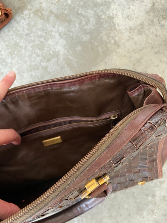 Coquette leather clutch bag