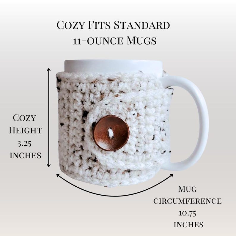 May include: A white crocheted mug cozy with a brown button. The cozy is 3.25 inches tall and fits a standard 11-ounce mug with a circumference of 10.75 inches.