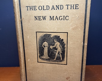 May include: A vintage book with a tan cover and black text that reads "The Old and The New Magic". The cover features a black and white illustration of a man and woman in period clothing.