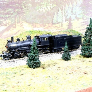 12 pcs of N Scale PINES by ELK RIVER. 1" 1.5" & 2" Hand-Made & Hand-Painted a Dark Alpine Green.