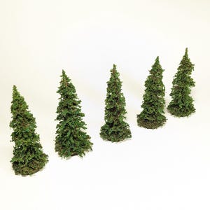 May include: Five miniature artificial evergreen trees with green foliage. The trees are arranged in a diagonal line against a white background. Each tree has a conical shape, with a textured appearance.