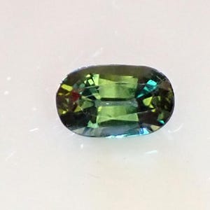 0.75 carat Oval 6.75 x 4.15 x 2.92 mm Dark Green Blue Colour Natural Australian Parti Sapphire Loose Rare Gemstone - OPS43