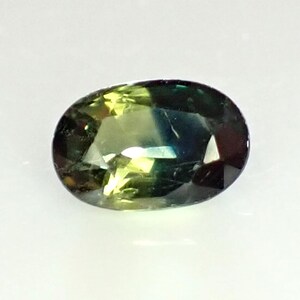 0,65 karaat ovaal 6,2 x 4,1 mm donkerblauw-geel twee kleuren natuurlijke Australische parti saffier losse zeldzame edelsteen 6 x 4 mm - OPS16