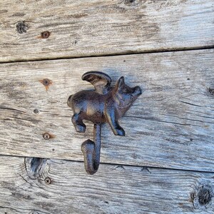 thumbnail image 2 of Flying Pig With Wings Cast Iron Wall Hook – Rustic Brown, Single Hook – Farmhouse Decor 2 of 5