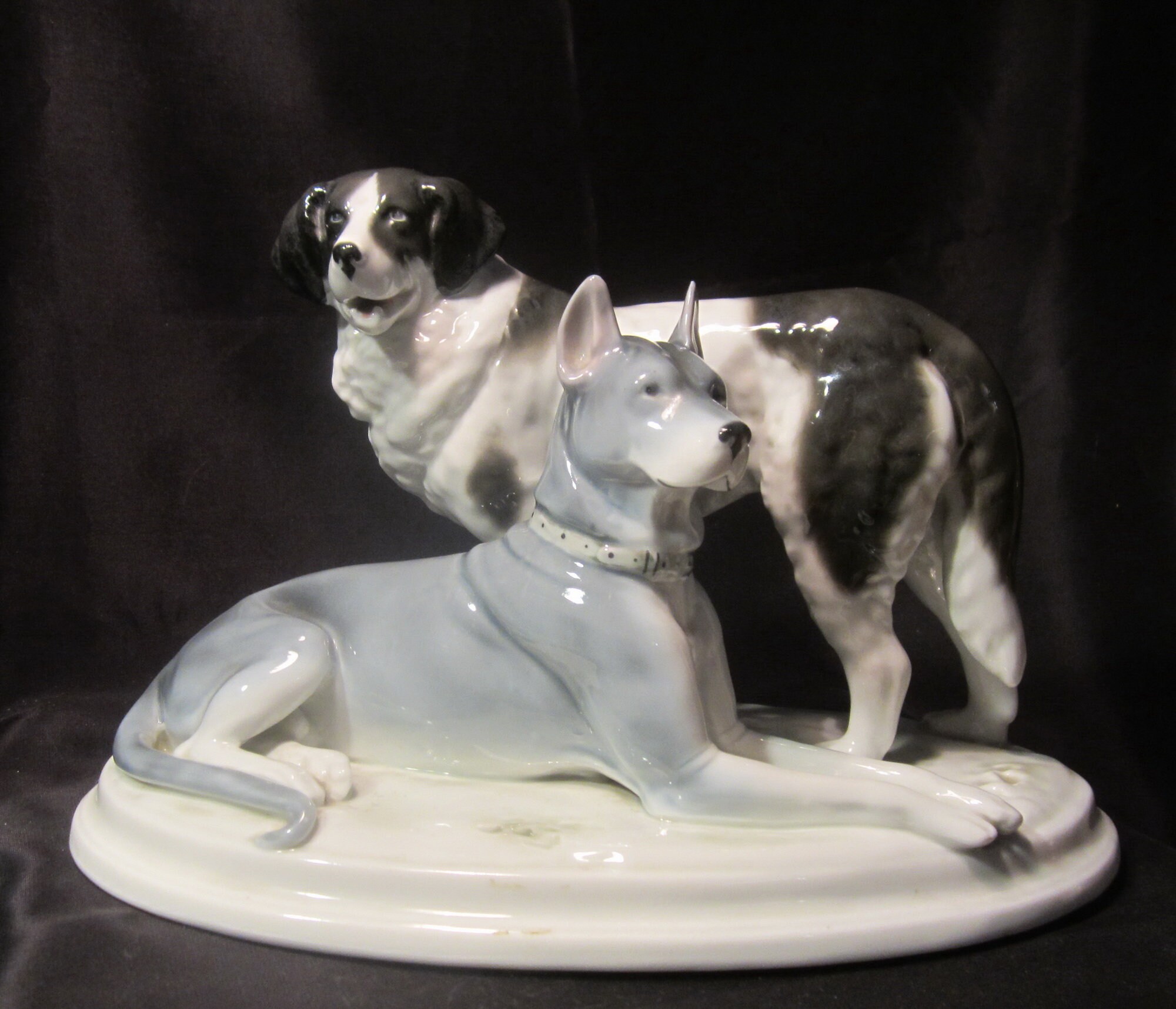 An antique Pfeffer Gotha group of dogs, Great Dane dog and shepherd, Germany,