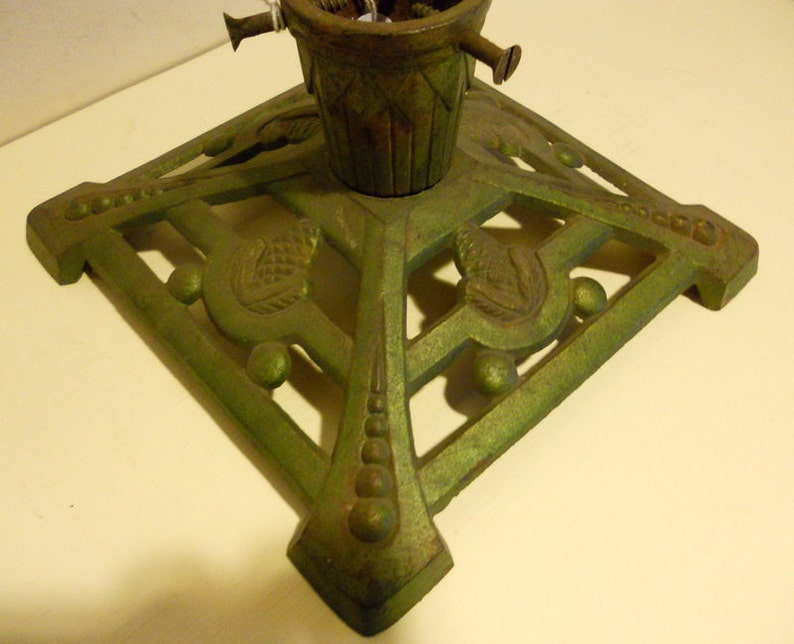 fir cone decoration; ca 1920 base; art deco Antique cast iron christmas tree stand holder