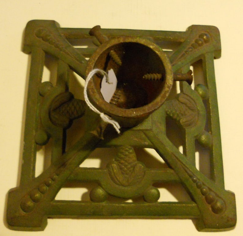 fir cone decoration; ca 1920 base; art deco Antique cast iron christmas tree stand holder