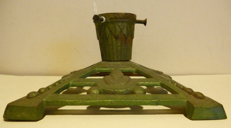 fir cone decoration; ca 1920 base; art deco Antique cast iron christmas tree stand holder
