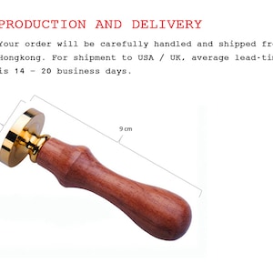 May include: A wax seal stamp with a polished gold-tone metal head and a smooth brown wooden handle. The stamp head has a diameter of 2.5 cm, and the total length of the tool is 9 cm. The design features a classic, ergonomic shape.