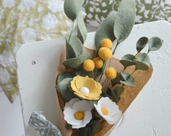 Bouquet of woolen field flowers and foliage for spring decoration