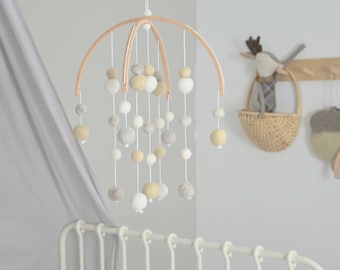 Natural white and beige mobile in felted wool balls