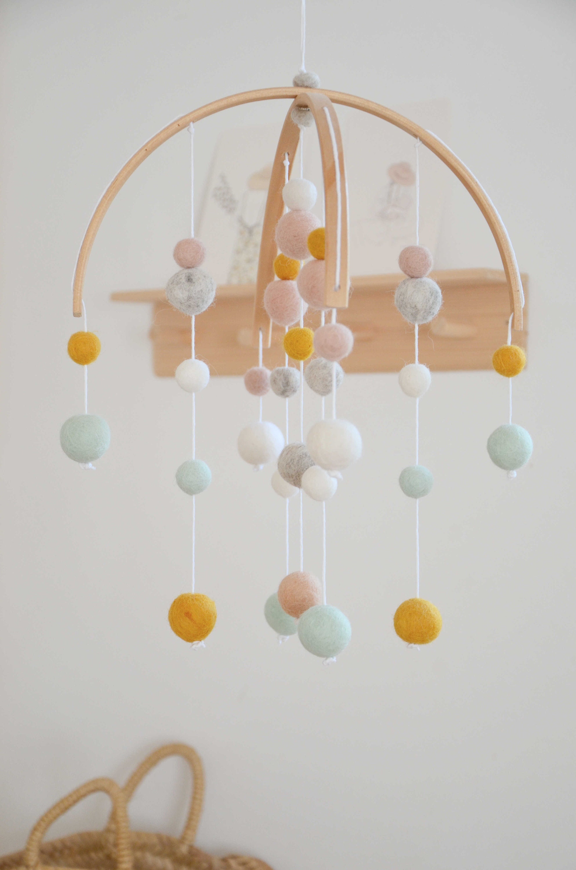 Simple Decorative Mobile Made of Wood and Wool 