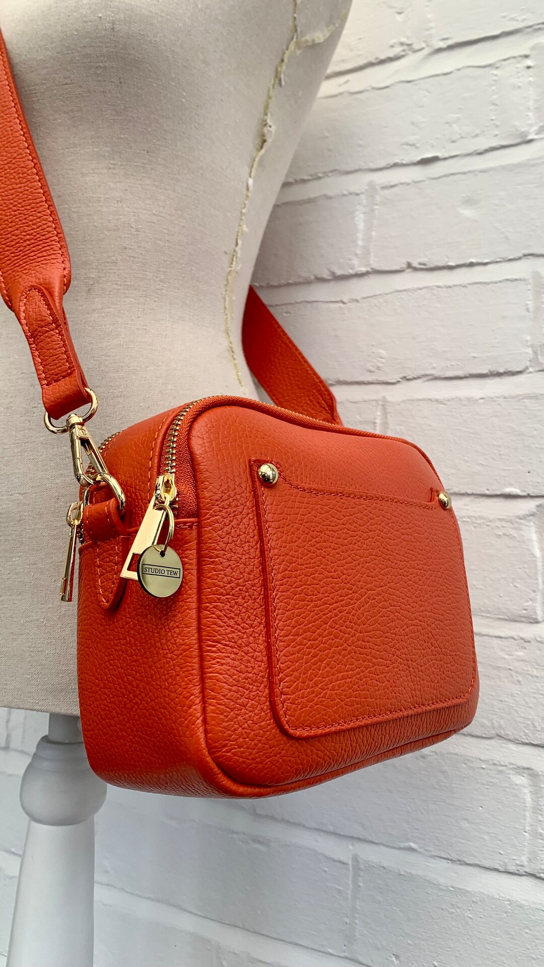 Orange leather crossbody bag hotsell