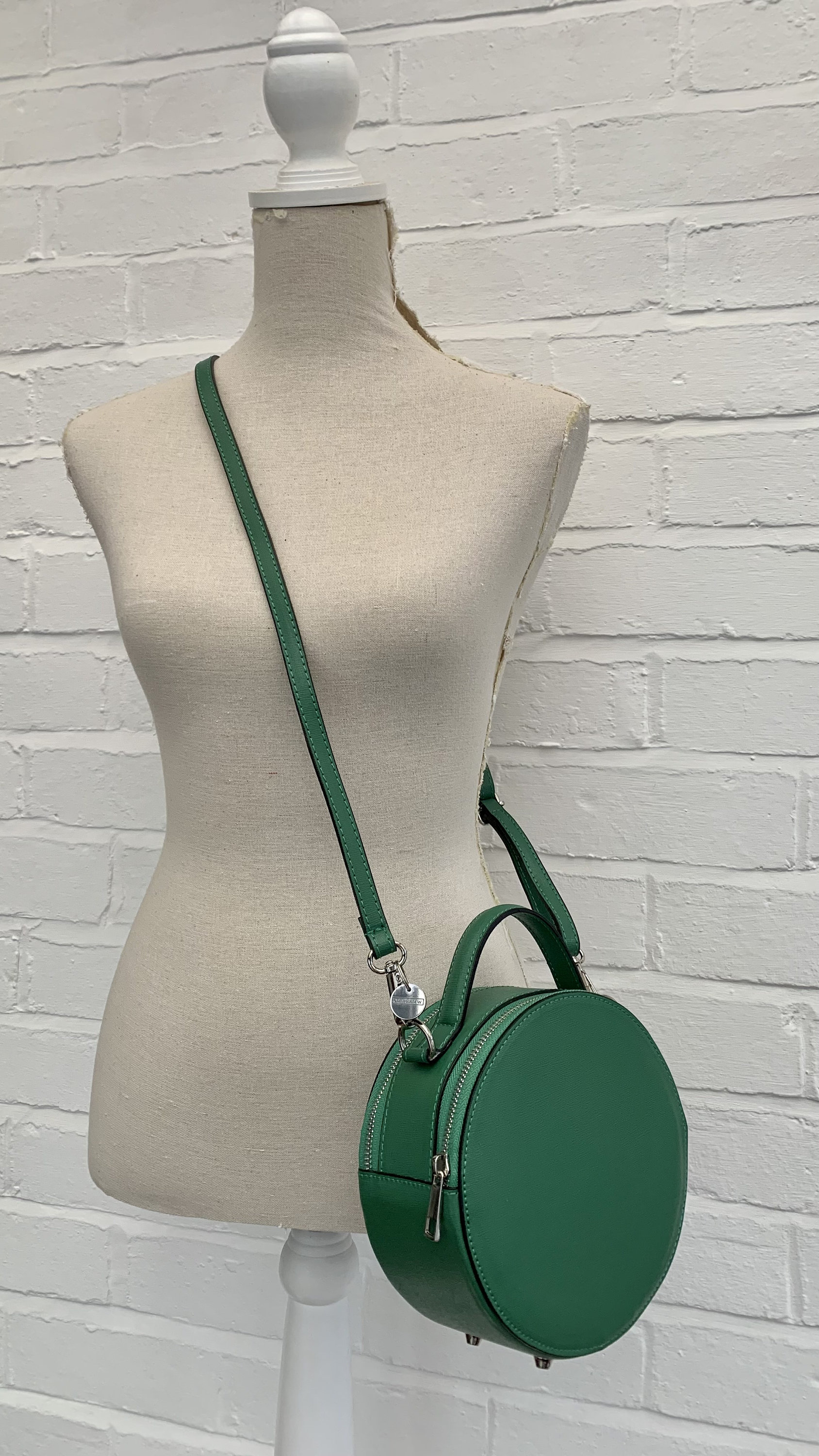 Oasis in Hunters Green, a star of the season. Both a crossbody and a  shoulder bag, made of handmade pleated leather, with a unique shape…