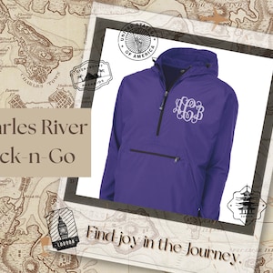 May include: Purple hooded pullover with a zipper and a monogrammed design. The text "Charles River Pack-n-Go" and "Find joy in the journey." are visible on the image.