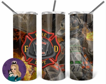 May include: A stainless steel tumbler with a firefighter theme. The tumbler features a red and black fire department logo with a firefighter helmet, the words "Fire Fighter Dept." and flames. The background is a camouflage pattern with a firefighter in the background.