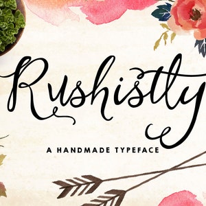 May include: A handwritten font called "Rushistly" with a floral design and two arrows. The text below the font says "A Handmade Typeface".