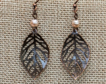 Pale pink pearl and dark copper leaf dangle earrings