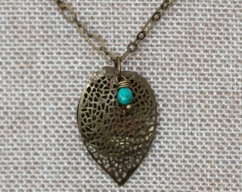 Bronze filigree leaf with turquoise bead essential oil diffuser necklace