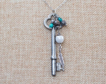 Antique silver skeleton key long necklace with silver and turquoise beaded dangles and small feather dangle
