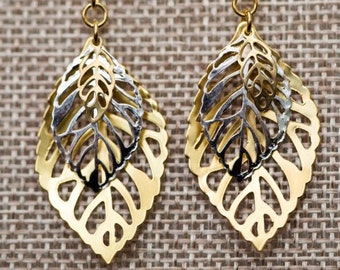 Gold and silver tone layered leaf earrings